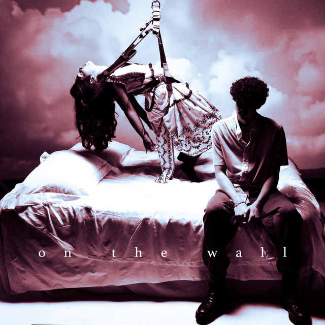 'on the wall*' cover art