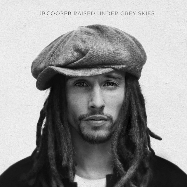 'Raised Under Grey Skies (Deluxe)' cover art